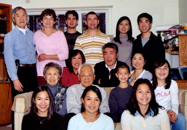 Row:1 (back, standing): John Wing Chin, Sarah Caroline Wheeler. Kevin Katcher (Diana's friend), Larry Michael Muzzelo, Eliza Wu (Alex's friend), Alex Ba Chin<br>
    Row 2: Helen Wun (Chin) Muzzelo, Don Shek Chin, Patricia (Sze) Chin<br>
    Row 3: Lun Mee (Hom) Chin, Bin Fong Chin, Benjamin Benhin Muzzelo, Rachel Waijun Muzzelo<br>
    Row 4: Diana Wheeler Chin, Christine Wai Muzzelo, Katherine Hom Chin